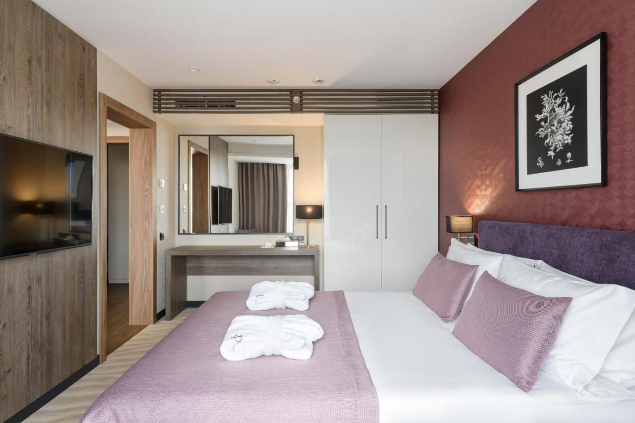 Premier Hotel Oděsa Exteriér fotografie A bedroom at the hotel
